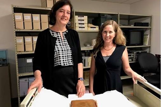Catherine McDowell, GSK Archivist, and Smithsonian curator Nancy Bercaw review the Allen book