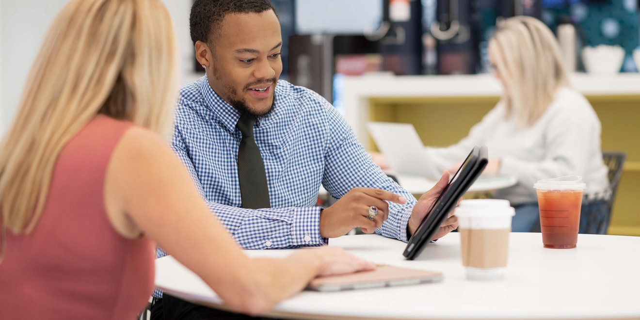 two employees in the office